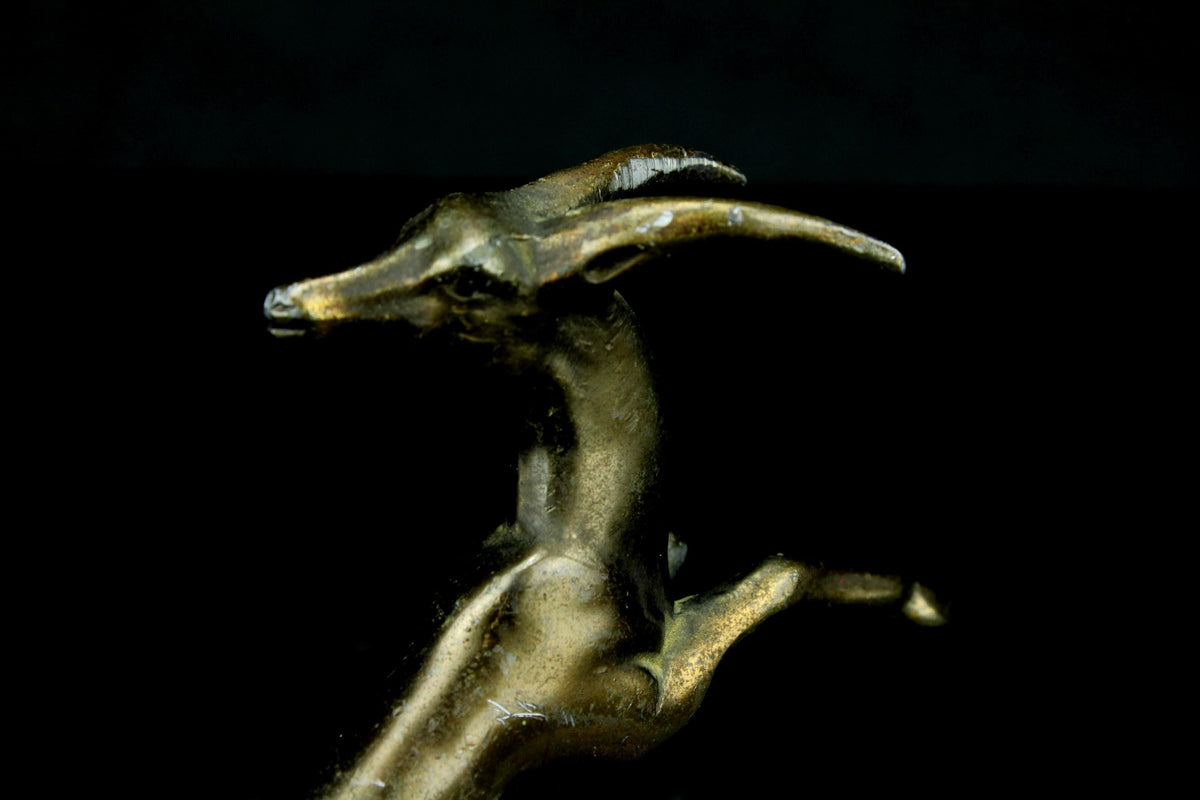 Messing springende antilope/gazellle  art déco  honingraatbasis  dierensculptuur beeldje  11 cm